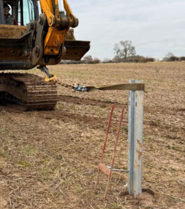 Solar farm development. Lateral in-situ testing on solar panel support pile.